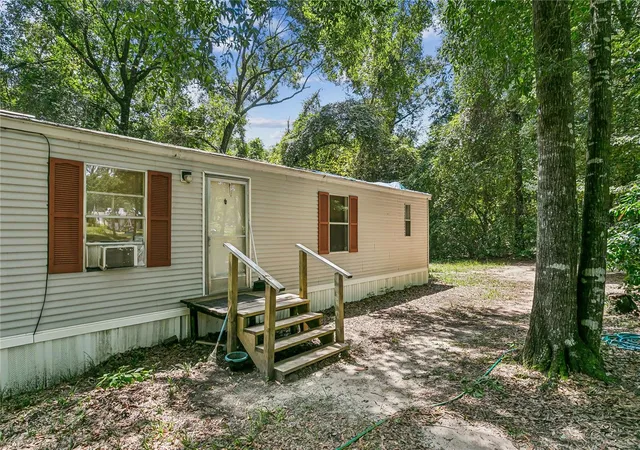 Photo 3 of Manufactured home for sale at 2323 Camors Rd, Jay, FL 32565 | MLS# TB8541451 | Listing updated on 2026-09-08