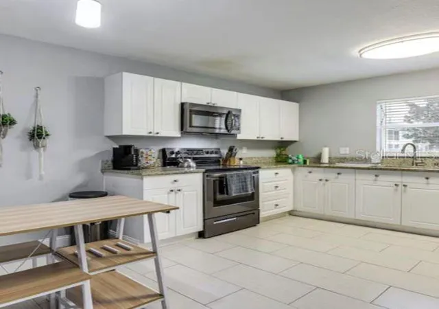 Photo 3 of Single family home for sale at 2704 Clb Cortile Cir, Kissimmee, FL 34746 | MLS# O6435819 | Listing updated on 2026-09-11
