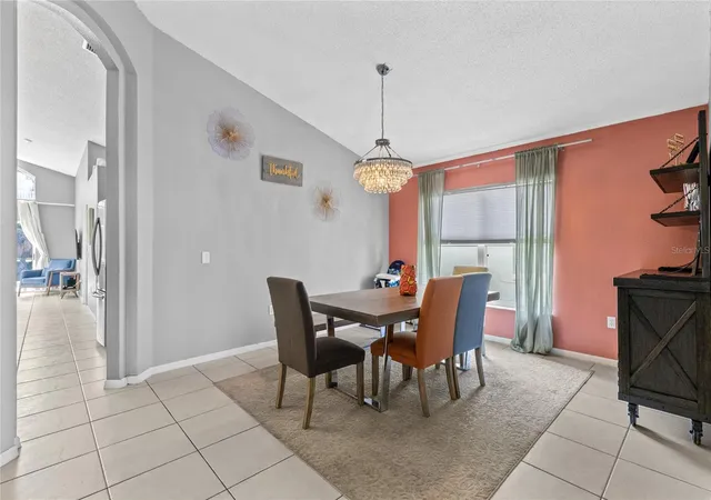 Photo 3 of Single family home for sale at 915 Lake Berkley Dr, Kissimmee, FL 34746 | MLS# O6436418 | Listing updated on 2026-09-16