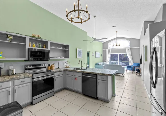 Photo 3 of Single family home for sale at 915 Lake Berkley Dr, Kissimmee, FL 34746 | MLS# O6436418 | Listing updated on 2026-09-16