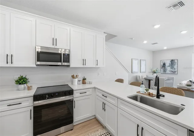 Photo 2 of Townhouse for sale at 5837 Angela Leyla Pl, Riverview, FL 33578 | MLS# W7889053 | Listing updated on 2026-10-05