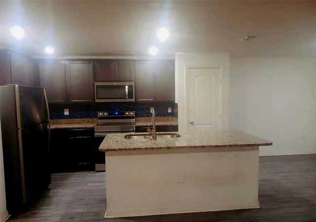 Photo 2 of Single family home for sale at 707 Caracara Ct, Kissimmee, FL 34759 | MLS# TB8544999 | Listing updated on 2026-10-20