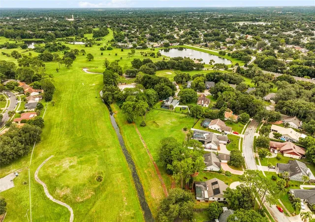 Photo 4 of Single family home for sale at 1448 Fairway Oaks Dr, Casselberry, FL 32707 | MLS# O6438680 | Listing updated on 2026-09-17
