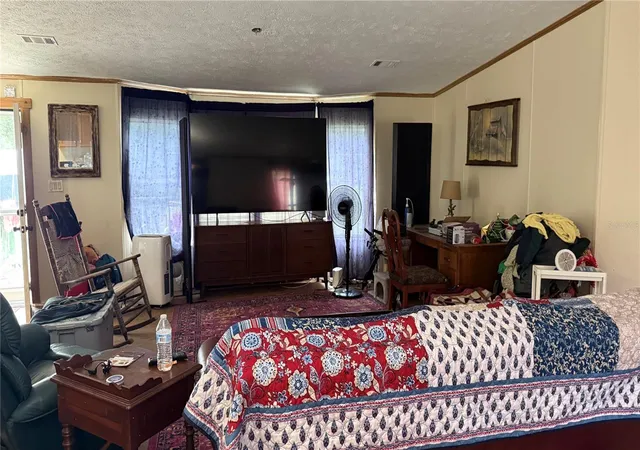 Photo 2 of Manufactured home for sale at 12171 Nw 168th Place, Reddick, FL 32686 | MLS# OM731605 | Listing updated on 2026-09-23