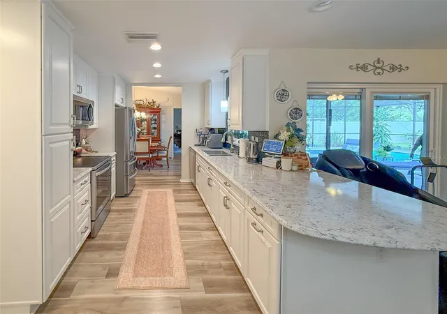 Photo 3 of Single family home for sale at 11019 Captain Dr, Spring Hill, FL 34608 | MLS# W7889225 | Listing updated on 2026-10-15