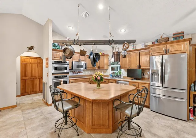 Photo 3 of Single family home for sale at 8699 SE 12th Court, Ocala, FL 34480 | MLS# OM731865 | Listing updated on 2026-10-13