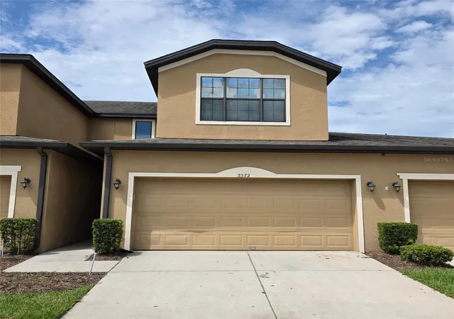 Photo 1 of Townhouse for sale at 2372 Seven Oaks Dr, Saint Cloud, FL 34772 | MLS# O6440032 | Listing updated on 2026-09-09