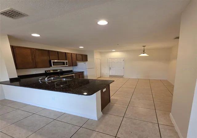 Photo 4 of Townhouse for sale at 2372 Seven Oaks Dr, Saint Cloud, FL 34772 | MLS# O6440032 | Listing updated on 2026-09-09