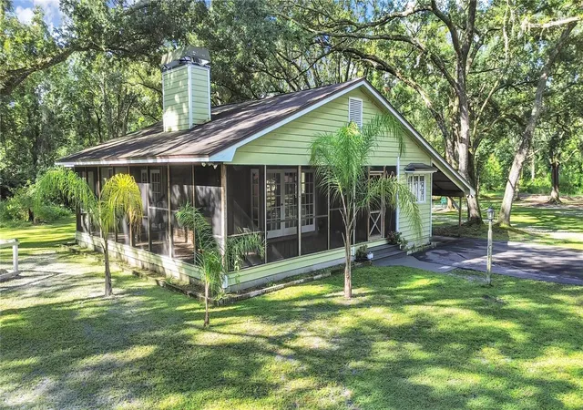 Photo 2 of Single family home for sale at 6075 Country Clb Rd, Wesley Chapel, FL 33544 | MLS# TB8548780 | Listing updated on 2026-09-19