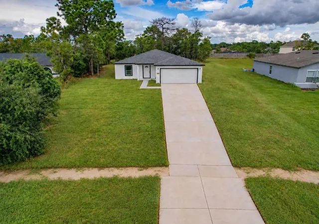 Photo 2 of Single family home for sale at 12493 Killian St, Spring Hill, FL 34609 | MLS# TB8549045 | Listing updated on 2026-09-28