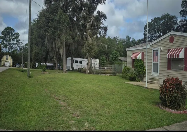 Photo 2 of Manufactured home for sale at 18845 Se 18th Place, Silver Springs, FL 34488 | MLS# OM732419 | Listing updated on 2026-09-24
