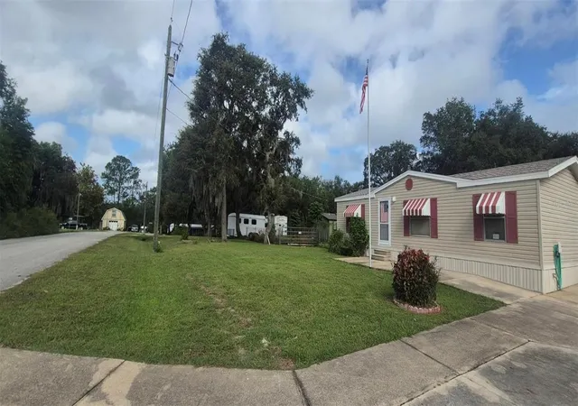 Photo 3 of Manufactured home for sale at 18845 Se 18th Place, Silver Springs, FL 34488 | MLS# OM732419 | Listing updated on 2026-09-24