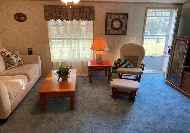 Photo 3 of Manufactured home for sale at 18845 SE 18th Place, Silver Springs, FL 34488 | MLS# OM732419 | Listing updated on 2026-09-24