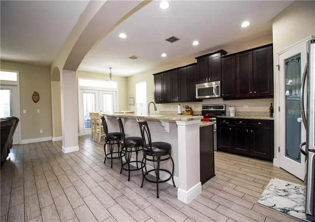 Photo 5 of Single Family Residence at 15465 Heron Hideaway Cir, Winter Garden, FL 34787 | MLS# O5877947 | | Sold on 2020-08-26