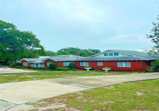 Photo 1 of Mansion for sale at 1200 W Lake Otis Dr Se, Winter Haven, FL 33880 | MLS# P4919411 | Listing updated on 2025-11-19