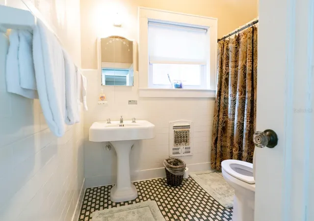 Photo 3 of Mansion for sale at 1200 W Lake Otis Dr Se, Winter Haven, FL 33880 | MLS# P4919411 | Listing updated on 2025-11-19