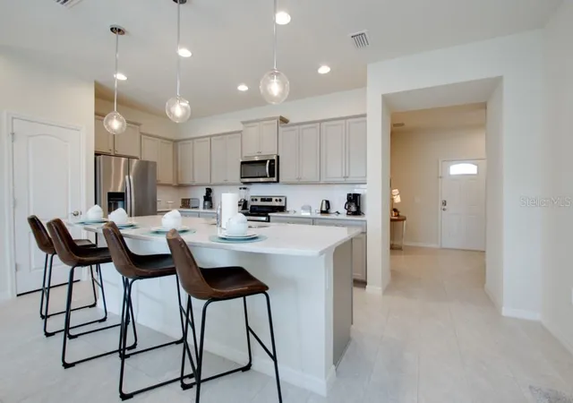 Photo 3 of Townhouse for sale at 8916 Sydney Ave, Kissimmee, FL 34747 | MLS# O6133760 | Listing updated on 2026-09-15