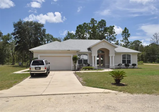 Photo 2 of Single family home for sale at 15580 Ne 16th Ln, Williston, FL 32696 | MLS# OM662949 | Listing updated on 2026-01-27