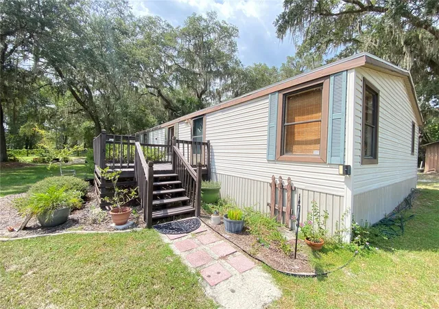1st image of 989 Ne 184th Pl, Citra, FL 32113 | MLS# OM663308