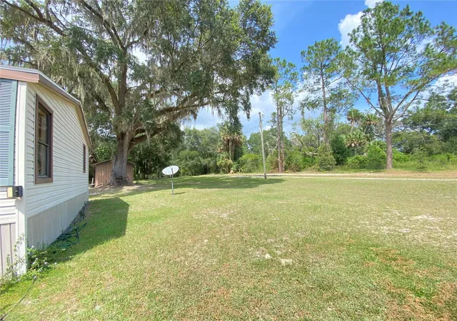 3rd image of 989 Ne 184Th Pl, Citra, FL 32113 | MLS# OM663308