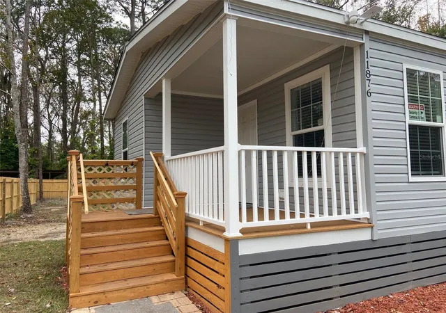 Photo 2 of Manufactured home for sale at 11876 Keylime Dr, New Port Richey, FL 34654 | MLS# W7857536 | Listing updated on 2026-10-07