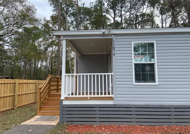 Photo 3 of Manufactured home for sale at 11876 Keylime Dr, New Port Richey, FL 34654 | MLS# W7857536 | Listing updated on 2026-10-07
