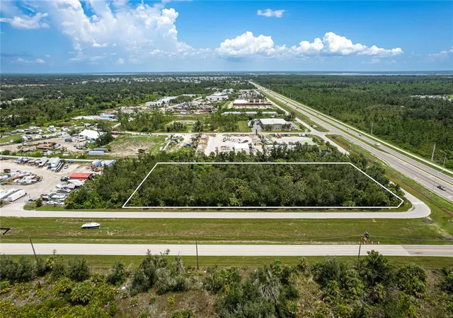 Photo 1 of Land for sale at 13440 Marathon Blvd, Port Charlotte, FL 33981 | MLS# A4583365 | Listing updated on 2026-01-02