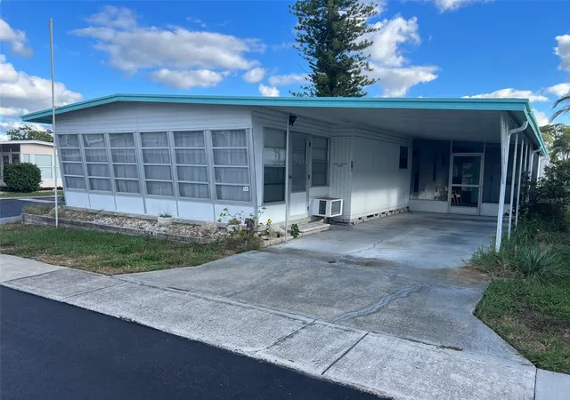 Photo 1 of Manufactured home for sale at 201 Royal Palm Cir, Largo, FL 33778 | MLS# U8218369 | Listing updated on 2026-08-06