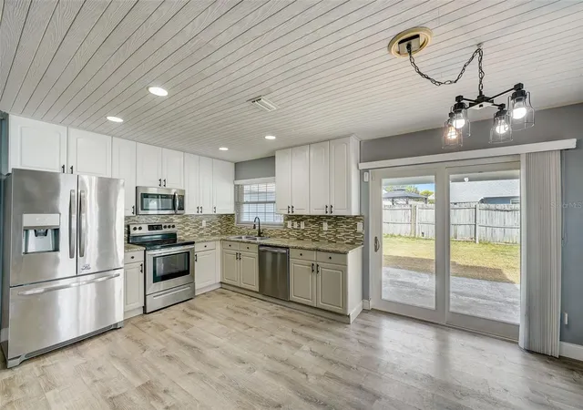 Photo 2 of Single Family Residence at 6917 Dunnett Ave N, Saint Petersburg, FL 33709 | MLS# T3502277 |  | Sold on 2024-04-23