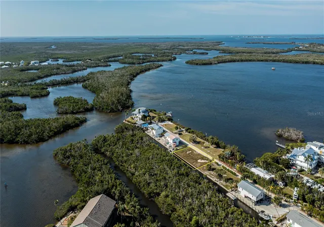 Photo 2 of Land for sale at 8153 Moyer Ln, Bokeelia, FL 33922 | MLS# C7488694 | Listing updated on 2026-02-17