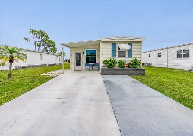Photo 1 of Manufactured home for sale at 7436 Arbela St, Port Charlotte, FL 33981 | MLS# C7491819 | Listing updated on 2026-09-30