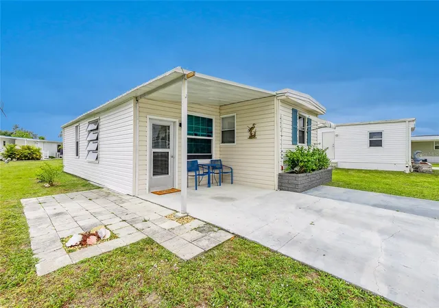 Photo 2 of Manufactured home for sale at 7436 Arbela St, Port Charlotte, FL 33981 | MLS# C7491819 | Listing updated on 2026-09-30
