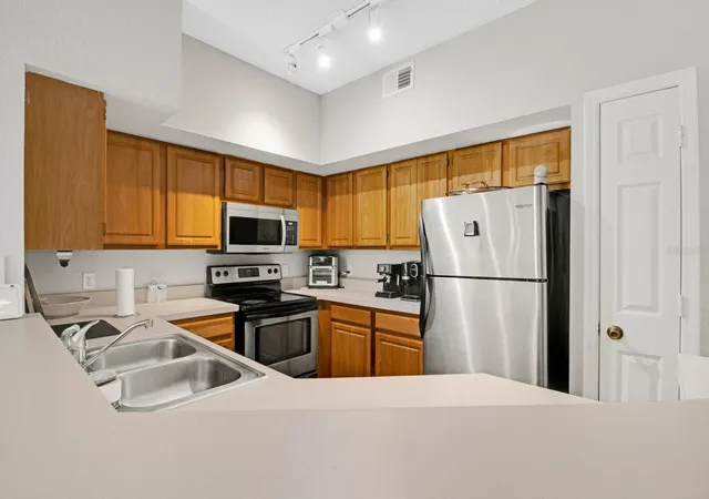 Photo 3 of Condo for sale at 13103 Mulberry Park Dr #8211, Orlando, FL 32821 | MLS# S5104180 | Listing updated on 2026-08-21
