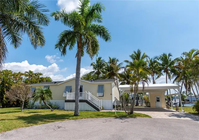 Photo 1 of Manufactured home for sale at 23 Holland Dr, Punta Gorda, FL 33950 | MLS# C7492820 | Listing updated on 2026-09-26
