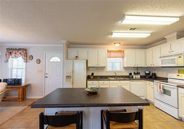 Photo 4 of Manufactured home for sale at 84 Windmill Blvd, Punta Gorda, FL 33950 | MLS# C7493693 | Listing updated on 2026-08-15