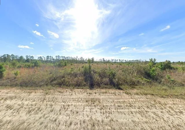 Photo 2 of Land for sale at 411 Portulaca Dr, Indian Lake Estates, FL 33855 | MLS# O6229438 | Listing updated on 2026-07-01
