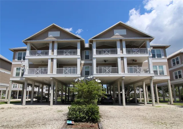 Photo 1 of Condo for sale at 221 3rd Ave E #F-102, Horseshoe Beach, FL 32648 | MLS# W7867769 | Listing updated on 2026-09-15
