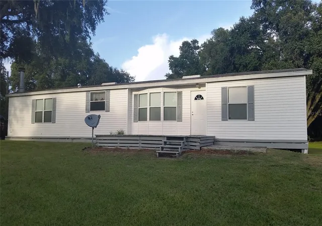 Photo 2 of Manufactured home for sale at 30340 Baylor Ln, Wesley Chapel, FL 33545 | MLS# T3551058 | Listing updated on 2026-08-15
