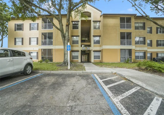 Listing Photo 2 - Condo for sale in building located at 7524 Seurat St, Orlando, FL 32819 - Unit #12301