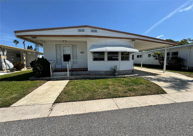 1st image of 2331 Belleair Rd #Lot 237, Clearwater, FL 33764 | MLS# TB8305789