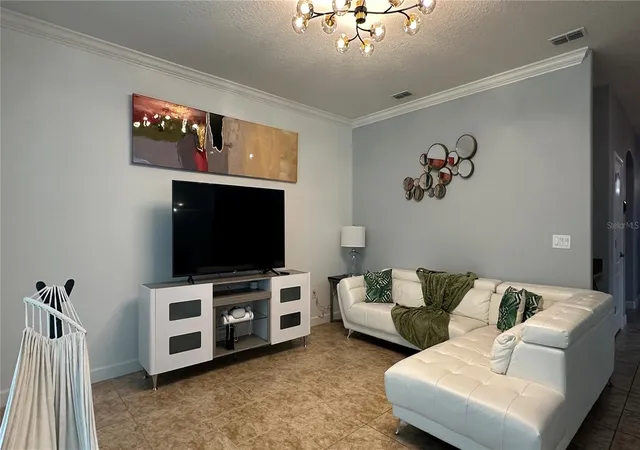 Photo 4 of Single family home for sale at 8860 Candy Palm Rd, Kissimmee, FL 34747 | MLS# S5114396 | Listing updated on 2026-08-11
