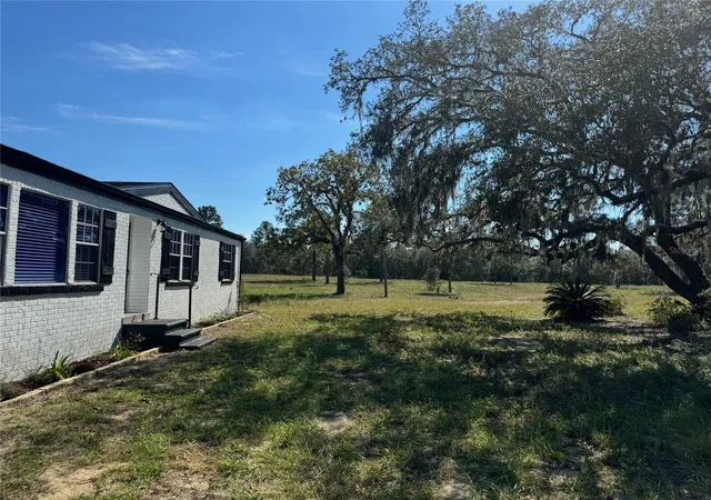 Photo 3 of Manufactured home for sale at 9437 N Singapore Ave, Dunnellon, FL 34433 | MLS# OM688309 | Listing updated on 2026-08-03
