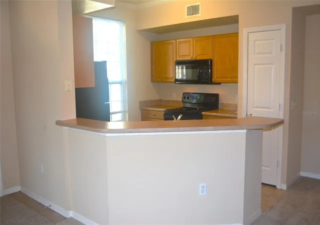 Photo 3 of Condo for sale at 5701 Soldier Cir #104, Sarasota, FL 34233 | MLS# A4627872 | Listing updated on 2026-07-31