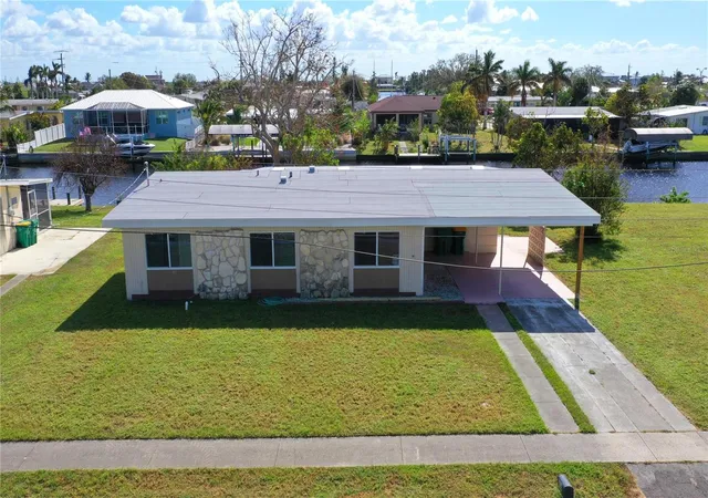 Photo 1 of Single family home for sale at 554 Lindley Ter, Port Charlotte, FL 33952 | MLS# C7499931 | Listing updated on 2026-06-20