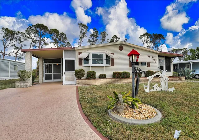 Photo 3 of Manufactured home for sale at 666 Alvarado, North Port, FL 34287 | MLS# TB8326516 | Listing updated on 2026-09-22