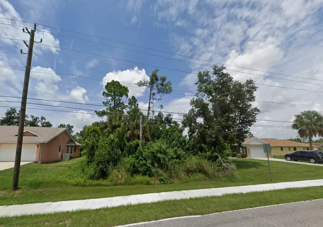 Photo 1 of Land for sale at 21086 Peachland Blvd, Port Charlotte, FL 33954 | MLS# C7501551 | Listing updated on 2026-02-18