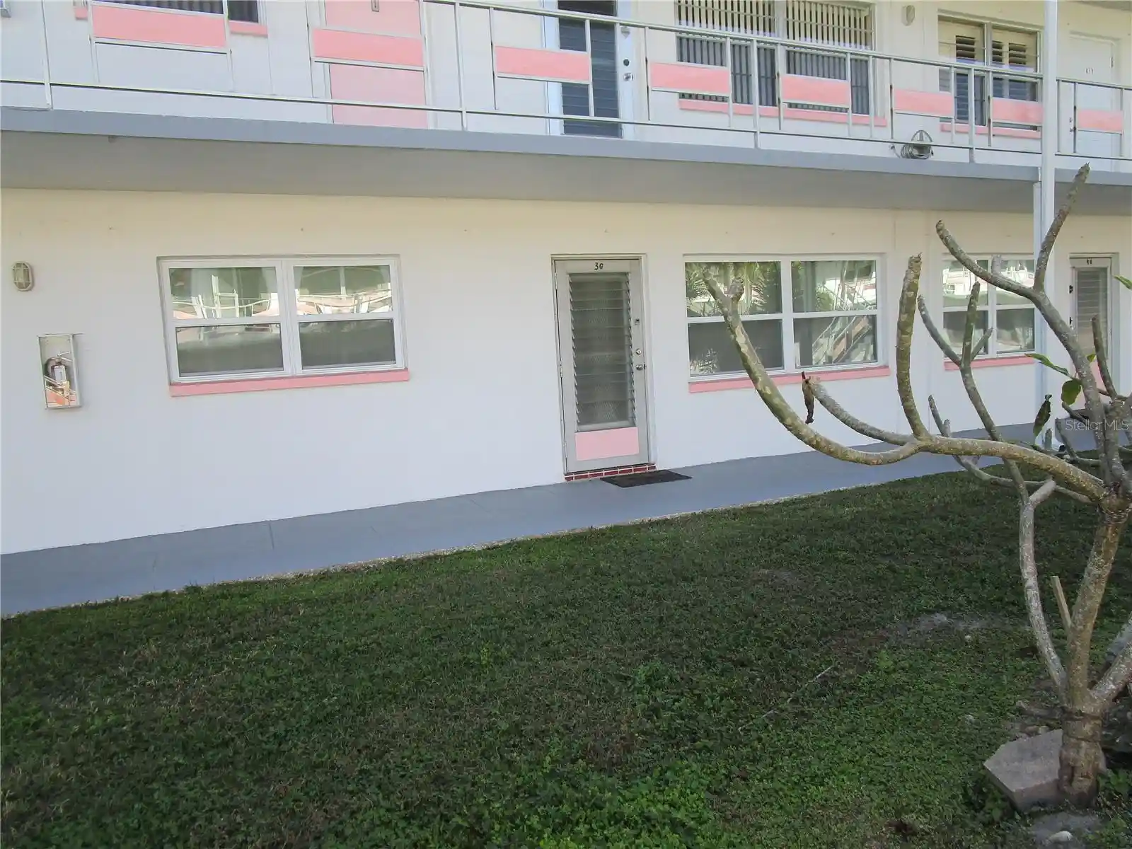 Listing Photo 1 - Condo for sale in 5876 21St St N located at 5876 21St St N, St. Petersburg, FL 33714 - Unit 5876 21st Street N