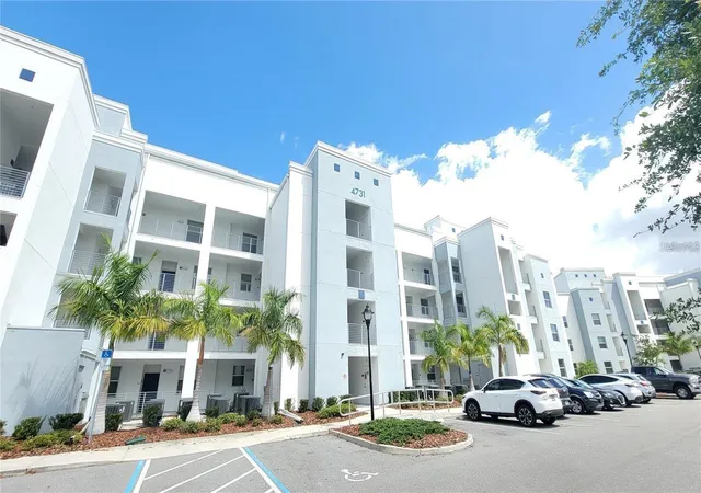 Listing Photo 1 - Condo for sale in building located at 4731 Clock Tower Dr, KISSIMMEE, FL 34746 - Unit #203