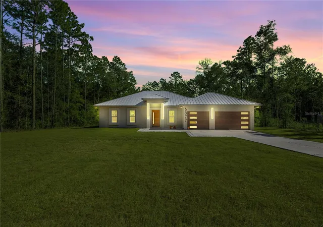 Photo 1 of Single family home for sale at 6877 Sw 131st Cir, Ocala, FL 34481 | MLS# OM693312 | Listing updated on 2026-09-25