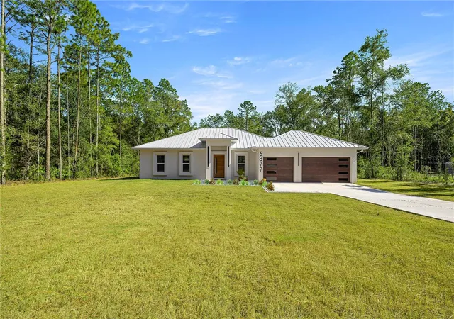 Photo 2 of Single family home for sale at 6877 Sw 131st Cir, Ocala, FL 34481 | MLS# OM693312 | Listing updated on 2026-09-25